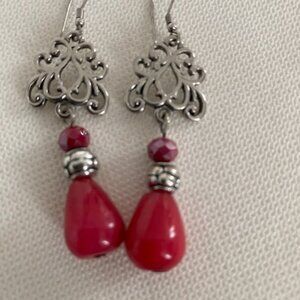 SILVER COLORED EARRINGS WITH RED STONES